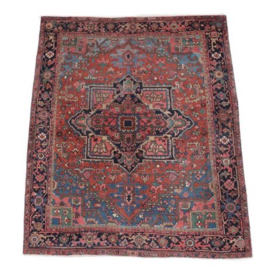 Lot 576 - Heriz Carpet of unusual size Iranian Azerbaijan, circa 1900 The terracotta field of angular...