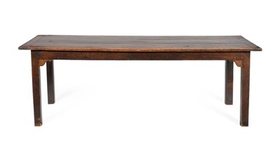 Lot 585 - A George III Joined Oak Dining Table, late 18th/early 19th century, of three plank construction...
