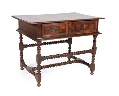 Lot 596 - A Late 17th Century Oak Side Table, with a two-as-one geometric moulded drawer, on bobbin...