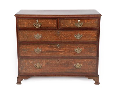 Lot 600 - A George III Oak and Mahogany Crossbanded Straight Front Chest of Drawers, circa 1780, the...
