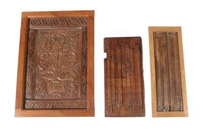 Lot 609 - Three Oak Panels, comprising a 17th century unframed panel, 48cm by 23cm, a linenfold panel,...