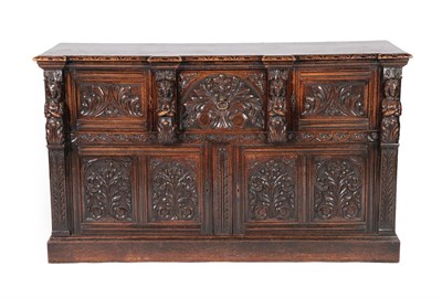 Lot 612 - A Victorian Carved Oak Sideboard, 3rd quarter 19th century, of breakfront form with central...