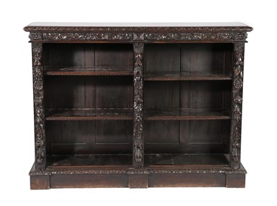 Lot 614 - A Victorian Carved Oak Free-Standing Bookcase, 3rd quarter 19th century, with stiff leaf carved...