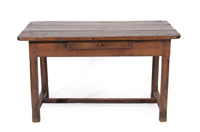 Lot 633 - An 18th Century Joined Oak Farmhouse Kitchen Table, the three-plank top above a single drawer,...
