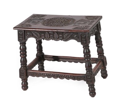 Lot 640 - A Victorian Scottish Carved Oak Stool, late 19th century, the top carved with eagles and a...