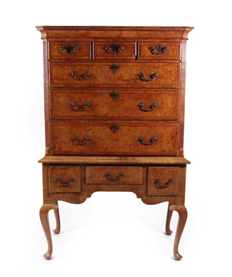 Lot 651 - A George II Figured Walnut and Feather-Banded Chest on Stand, mid 18th century, the moulded cornice