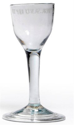 Lot 17 - An Electioneering Wine Glass, circa 1760-65, the ogee bowl engraved HUZZAH LOWTHER AND UPTON,...