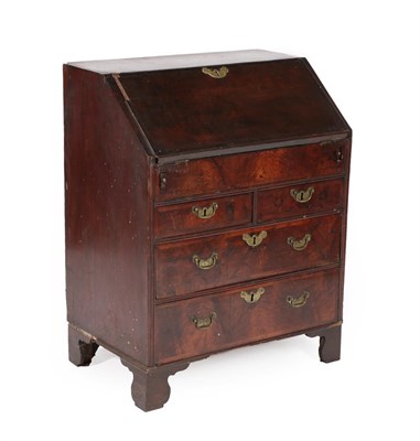 Lot 662 - A George II Walnut and Feather-Banded Bureau, 2nd quarter 18th century, of small proportions,...