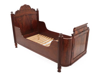 Lot 663 - A Mid 19th Century Flame Mahogany Single Bedstead, with panelled headboard and footboard all...