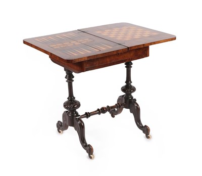 Lot 666 - A Victorian Figured Walnut Work/Games Table, circa 1880, the pivoting top with Tunbridgeware mosaic