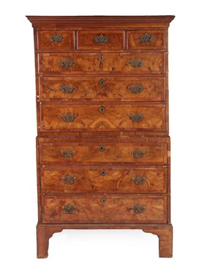 Lot 682 - A George II Walnut and Crossbanded Chest on Chest, 2nd quarter 18th century, the cavetto...