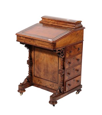 Lot 689 - ~ A Victorian Figured Walnut and Crossbanded Davenport, circa 1870, the moulded top with hinged lid