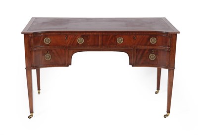 Lot 696 - A George III Style Mahogany and Leather Top Writing Table, late 19th/early 20th century, the reeded