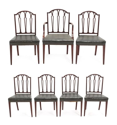 Lot 711 - A Set of Seven George III Style Mahogany Dining Chairs, labelled Made by G Baker, Chippendale...