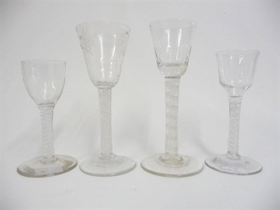 Lot 22 - A Wine Glass, circa 1760, the semi-fluted rounded funnel bowl on a double series opaque twist...