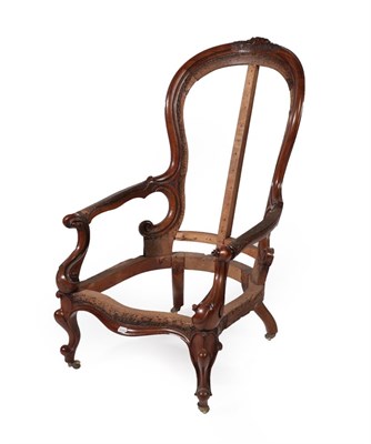 Lot 716 - A Victorian Carved Walnut Chair Frame, circa 1870, the top rail carved with flowers above...