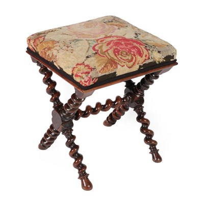 Lot 721 - A Victorian Rosewood Dressing Stool, mid 19th century, with floral needlework seat, on a spiral...