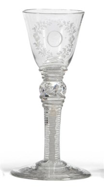 Lot 23 - An Engraved Wine Glass, circa 1765, the round funnel bowl engraved with initial O within a frame of