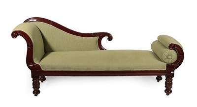 Lot 727 - ~ An Early Victorian Carved Mahogany Scroll-End Day Bed, circa 1850, recovered in green fabric,...