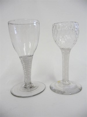 Lot 25 - A Wine Glass, circa 1765, the ovoid bowl with all-over honeycomb moulding, on a  double series...