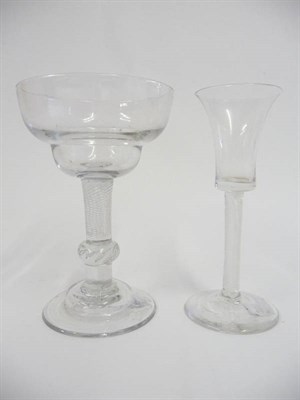 Lot 30 - A Champagne Glass, circa 1750, the double ogee bowl on a multiple spiral air twist stem with...