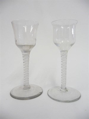 Lot 31 - A Wine Glass, circa 1765, the semi-fluted ogee bowl on double series opaque twist stem and circular