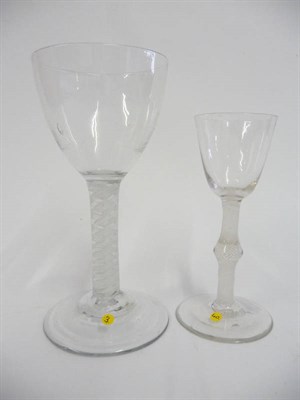 Lot 32 - A Wine Goblet, circa 1765, the plain ovoid bowl on a double-series opaque twist stem comprising two