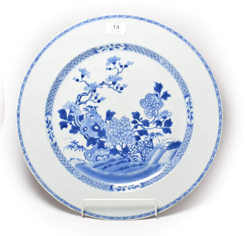 Lot 14 - A 19th century Chinese export blue and white charger (a.f.)