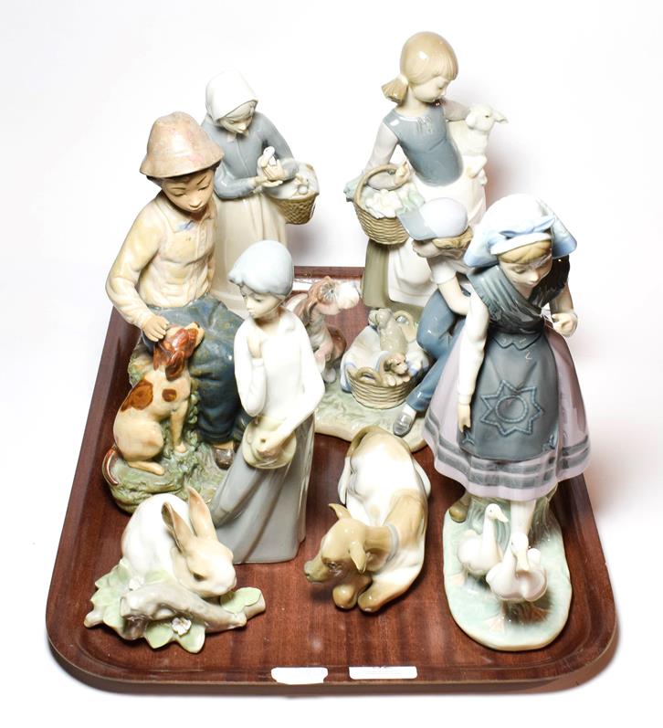 Lot 32 - Six Lladro figural and animal theme ceramics, and two others by Casades and Nao (8)