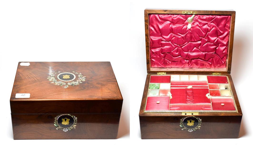 Lot 40 - A Victorian walnut work box inlaid with mother-of-pearl