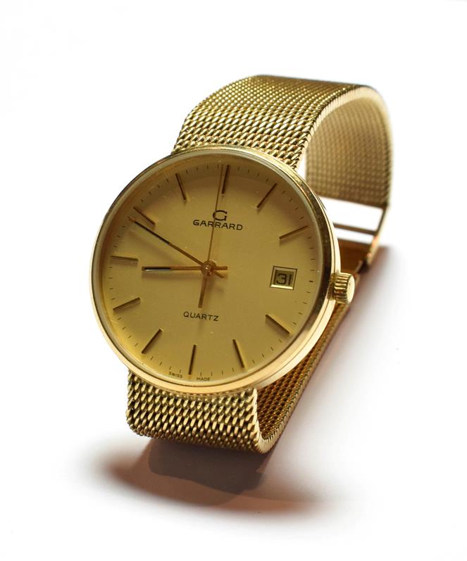 Lot 45 - A 9 carat gold Garrard wristwatch, with a Garrard box