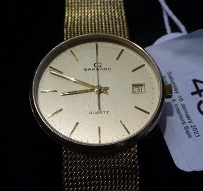 Lot 45 - A 9 carat gold Garrard wristwatch, with a Garrard box