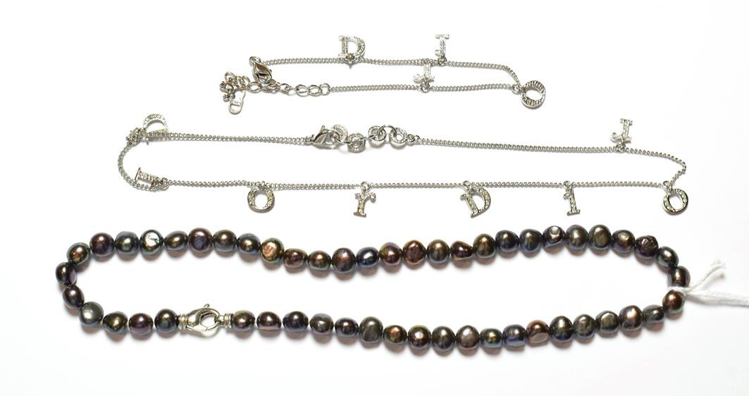 Lot 50 - A simulated pearl necklace, stamped '925', length 42.3cm; and a plated necklace and bracelet suite
