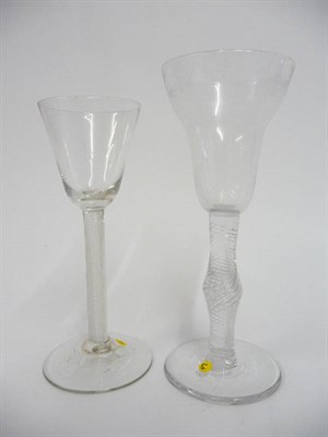 Lot 38 - A Wine Glass, circa 1750, the round funnel bowl on a multi spiral air twist stem, 16.1cm high; and