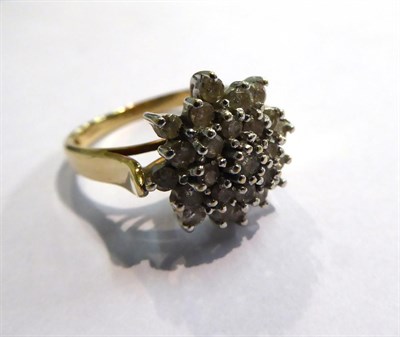 Lot 64 - A 9 carat gold diamond cluster ring, finger size S