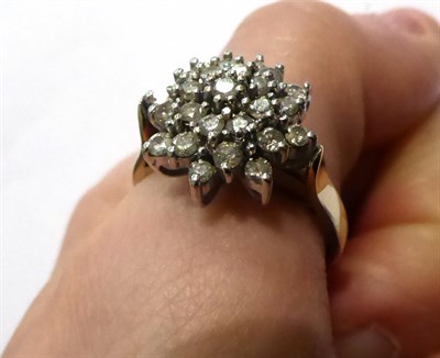 Lot 64 - A 9 carat gold diamond cluster ring, finger size S