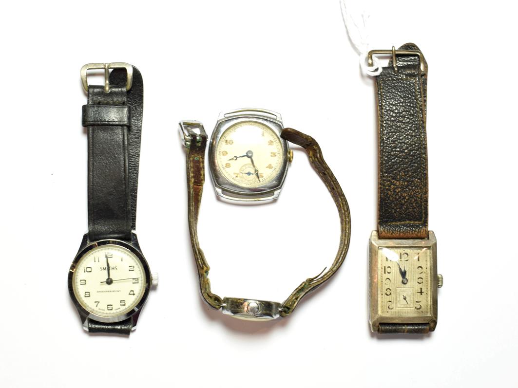 Lot 71 - A silver Art Deco rectangular wristwatch, a J.W. Benson chrome plated wristwatch, a Smiths...