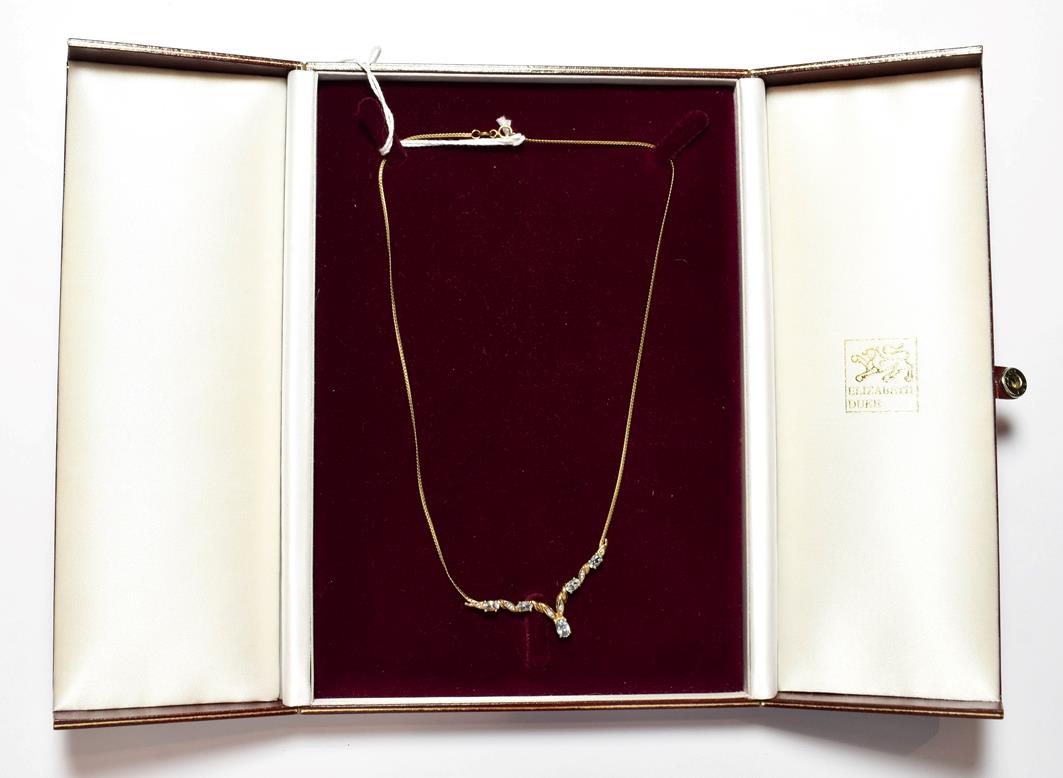 Lot 82 - A 9 carat gold gem set necklace, length 42cm
