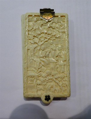 Lot 88 - A 19th century Canton carved ivory aide memoir, a carved ivory Chinese puzzle, silver...