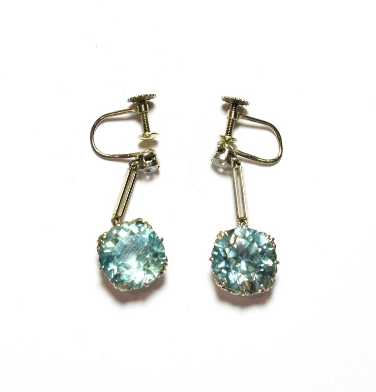 Lot 89 - This Lot Is Being Sold on Behalf of a Charity: a pair of blue zircon and diamond drop earrings,...