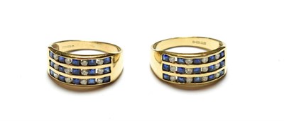 Lot 90 - A pair of 9 carat gold sapphire and diamond rings, formed of three rows of five calibré cut...