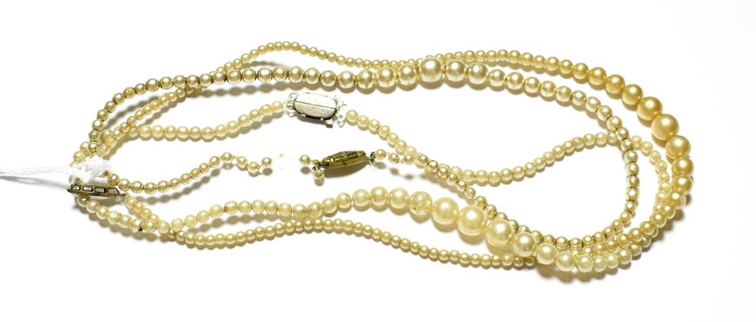 Lot 95 - Three graduated simulated pearl necklaces, various lengths