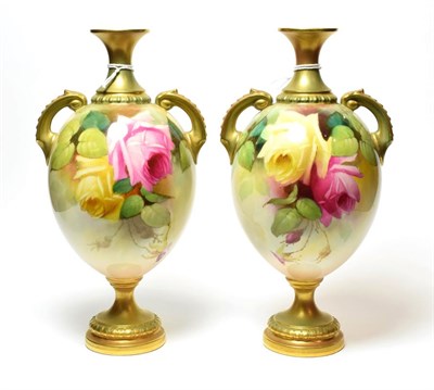 Lot 103 - A pair of Royal Worcester twin-handled rose decorated vases, shape number 2304. One monogramed...
