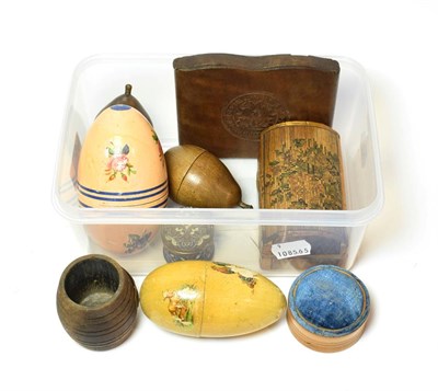 Lot 111 - A collection of treen comprising two pears, two eggs - one with needlework items, an early...
