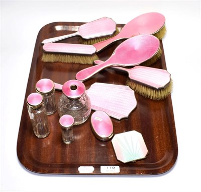 Lot 119 - A collection of George V silver and enamel dressing-table items, each with pink enamel over...
