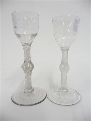 Lot 45 - A Wine Glass, circa 1760, the semi-fluted ogee bowl on knopped double series opaque twist stem...