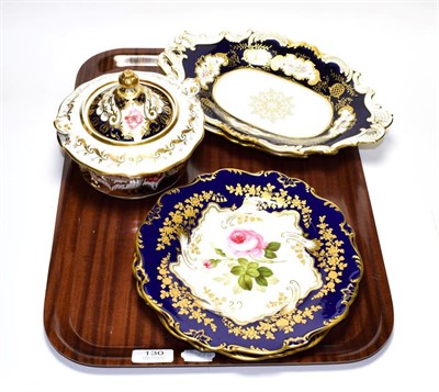 Lot 130 - A pair of 19th century cobalt blue floral painted porcelain gilt decorated cabinet plates,...