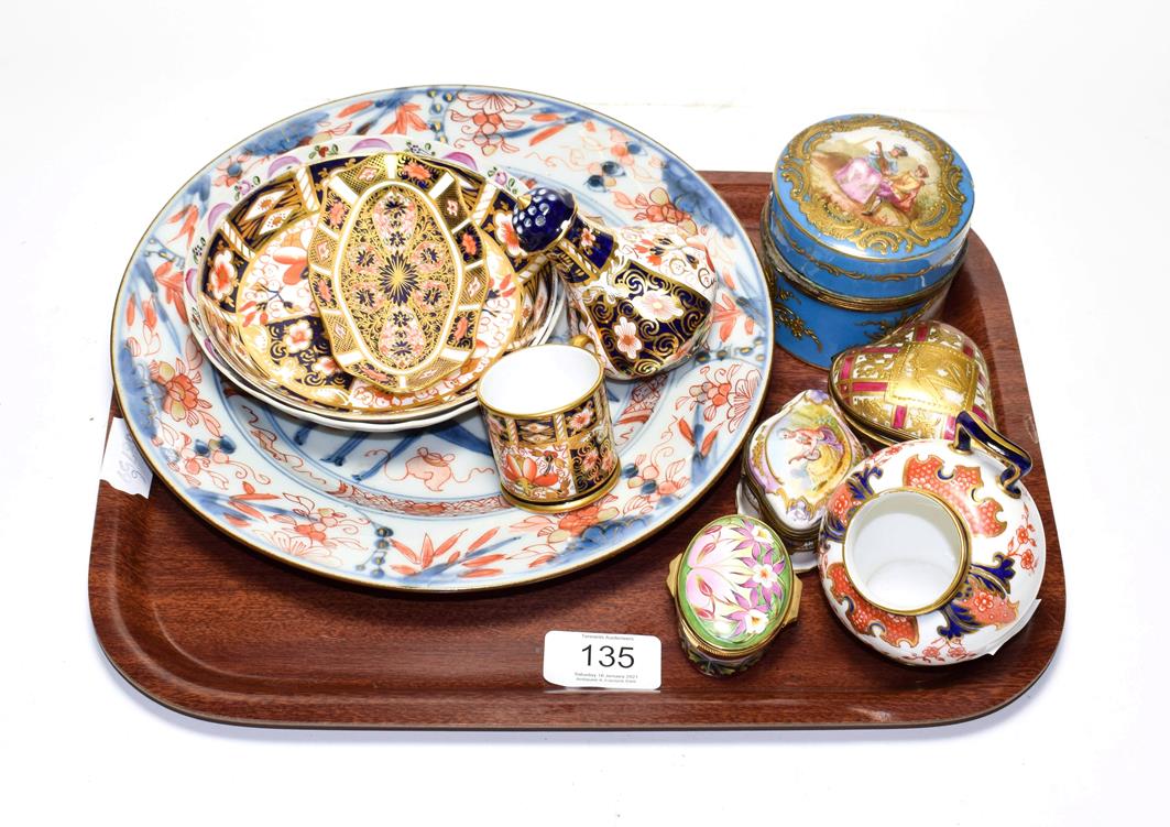 Lot 135 - Five Royal Crown Derby pieces comprising a miniature tankard, small dish, pepper, a saucer and...
