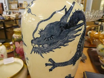 Lot 140 - A Mintons Art Pottery studio pottery vase decorated with a three claw dragon, height 36.5cm