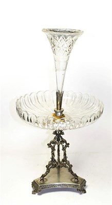 Lot 141 - A Victorian silver plate and glass table centrepiece, on triangular base and with openwork cast...